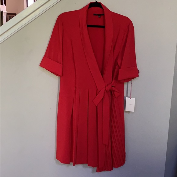 Alex Marie
Arielle Short Sleeve V-Neck Tie Front Romper Dress. - Picture 2 of 12